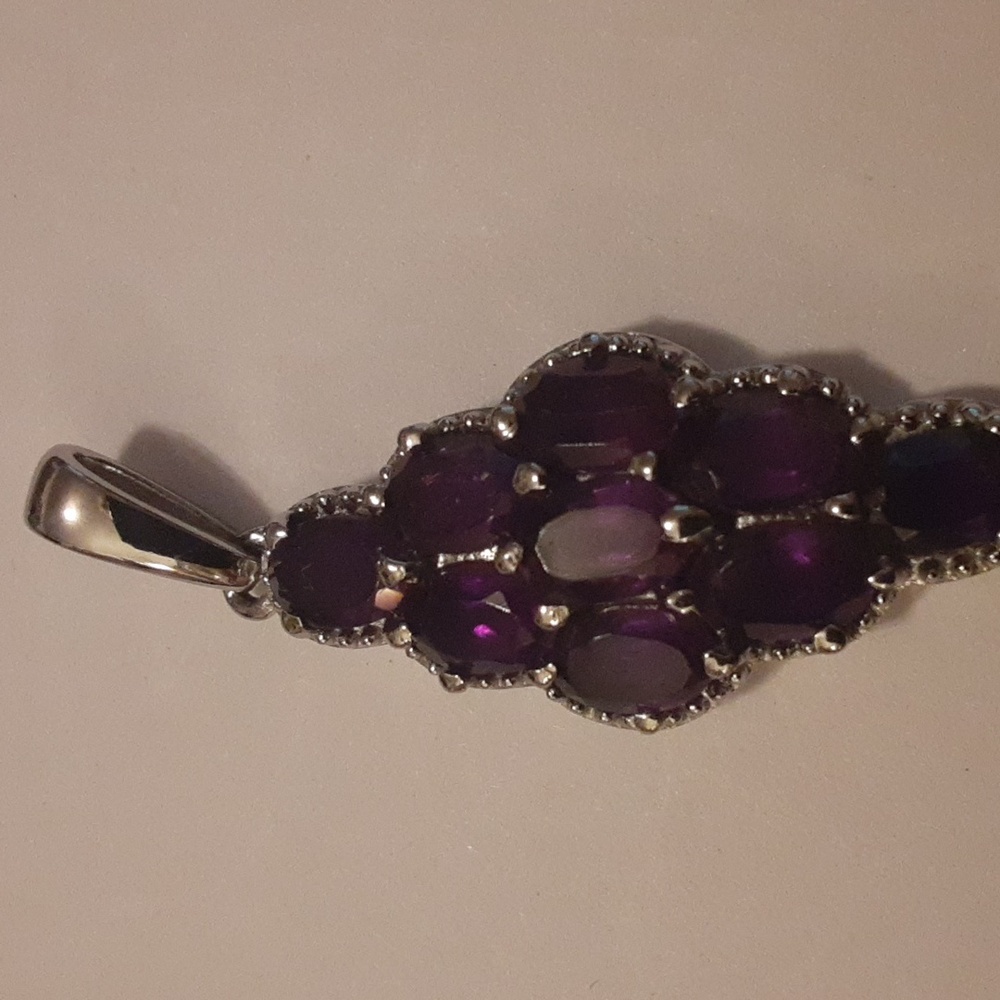 PRICE DROP! Amethyst pendant in stainless steel.